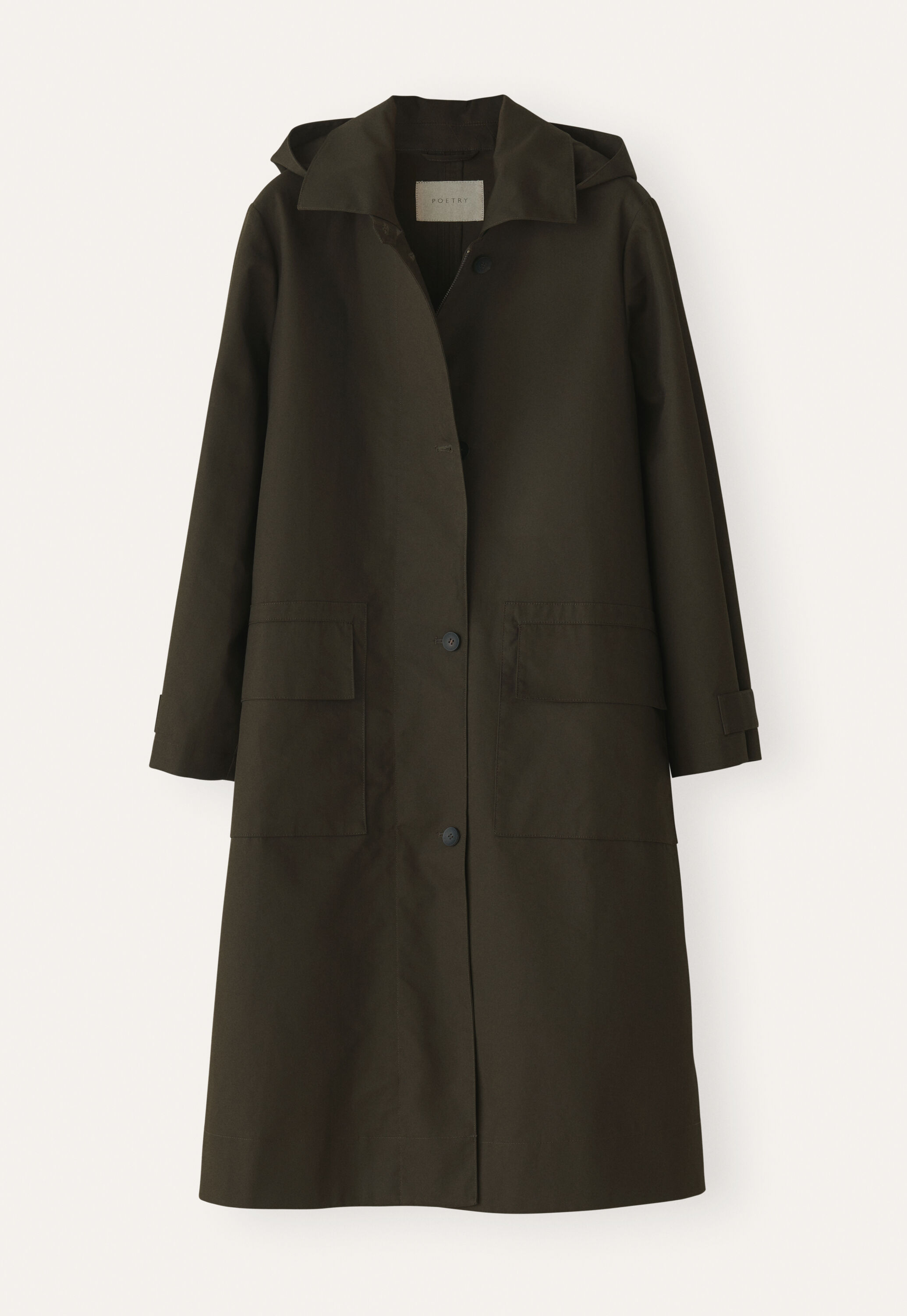 A wide placket that fastens with real horn buttons. There are stitched-on jetted pockets for your essentials.